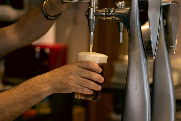 Tips For Pouring Beer From A Pitcher For The Best Taste